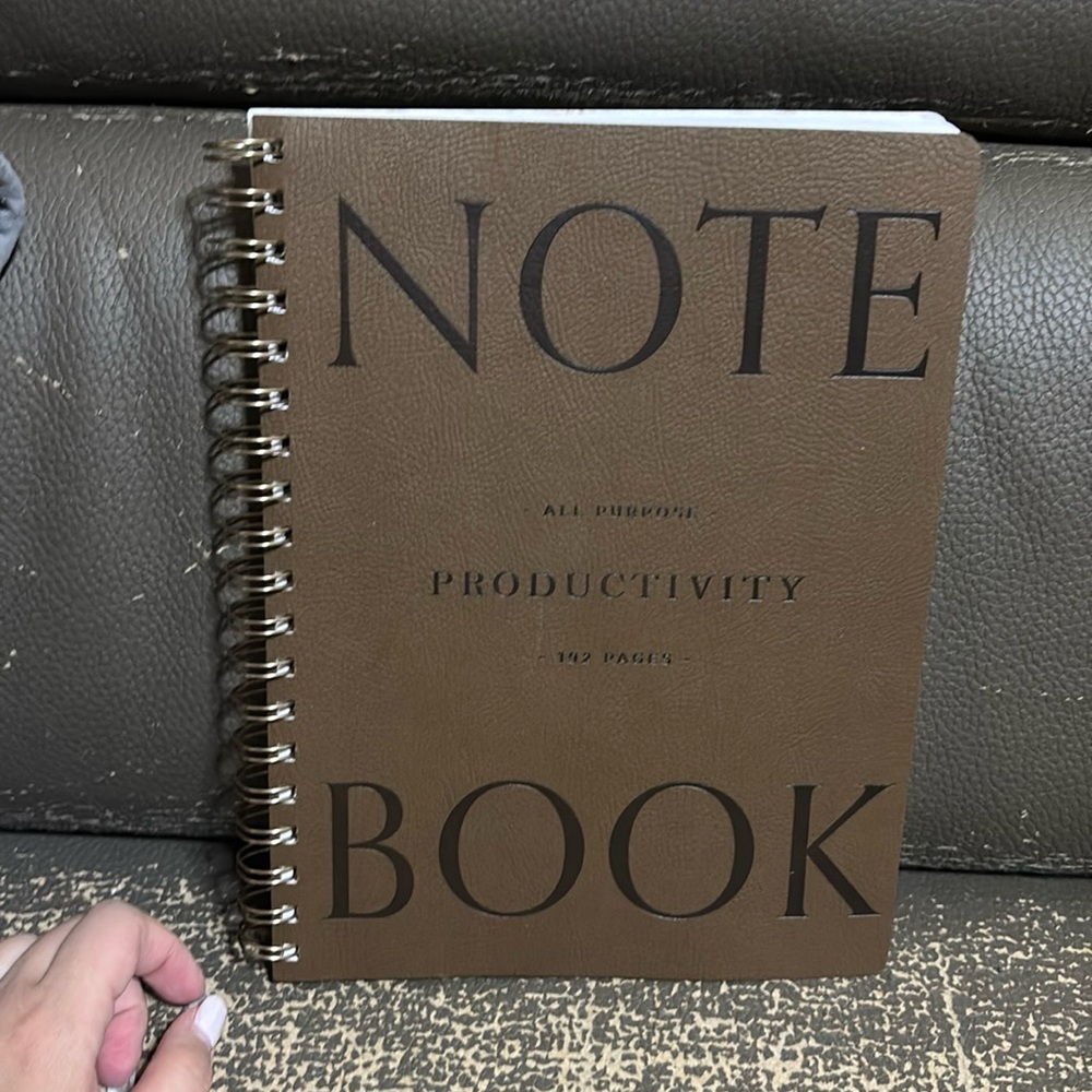Brown color spiral notebook